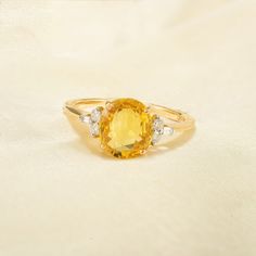 Product information- ~ Solid 18K Yellow Gold ~ Weight: 3.27grams ~ Gemstone Weight- 2.310ct (Sapphire), 0.150ct (Diamond)   ~ Natural Yellow Sapphire & Diamond   ~ Exclusive Designer Jewellery Sapphire is reputed to possess various healing properties, both physical and emotional. Physically, it is believed to alleviate headaches, migraines, and eye-related issues. It is also considered beneficial in treating thyroid disorders, reducing inflammation, and aiding in overall cellular regeneration. Feedback If you are not satisfied with your purchased items then contact with us first before leaving negative or neutral feedback or opening disputes. We believe in solving the issues. A positive feedback represents our service, product quality and dedication towards customer's satisfaction. Our fut Gia Certified Gold Sapphire Ring, Gold Sapphire Ring With Diamond Baguette Cut, Yellow Sapphire Ring With Diamond Accent Stones, Yellow Sapphire Diamond Ring With Accent Stones, Gold Sapphire Ring With Baguette-cut Center Stone, Yellow Gold Sapphire Baguette Cut Ring With Accent Stones, Gold Sapphire Ring With Baguette Cut, Yellow Sapphire Ring, Baguette Diamond Ring