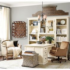 a home office with an animal print ottoman