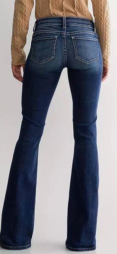 Discover ultimate style and comfort with No Boundries Juniors Double Button High Rise Flare Stretch Dark Wash Denim Jeans.  Quality constructed from stretch denim fabric, these jeans offer a figure flattering fit and comfort.   Classic 5-pockets and trendy flare leg design adds a touch of retro fashion with a casual flair.  Add these figure flattering must-have jeans to your wardrobe today! Features: No Boundries Double Button High Rise Flare Jeans Available in Size 5 and 11 High rise flare Slim through hip and thigh Full length inseam Quality stretch denim fabric constructed from a blend of 71% cotton, 19% recycled polyester, 8% rayon, 1% spandex Double button, metal zipper closure Classic 5 pocket design with metal studs accent Size 5 measurements:  Inseam 30";  Waist 26" Size 11 measure Glee Fashion, High Rise Flare Jeans, Stretch Denim Fabric, Leg Design, Dark Wash Denim, Metal Zipper, Denim Fabric, Pocket Design, Flare Jeans