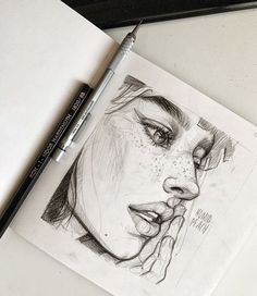 a pencil drawing of a woman's face