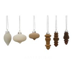 six ornaments hanging from strings on a white background