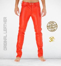 Intensify Your Wardrobe with Our Red Cow Aniline Leather Pants for Men Elevate your style with our Red Leather Pants crafted from luxurious cow aniline leather, showcasing its natural structure and exquisite softness. The straight-cut design features a chic button placket closure and a low waist height, embodying modern sophistication. Enjoy a seamless silhouette without a knee seam and enhanced comfort with inner lining. Key Features: Leather Type: Cow Aniline Leather Cut: Straight Cut Closure: Button Placket Waist Height: Low Knee Seam: None Inner Lining: Included Sizing Information: For accurate sizing, please select your measurements during custom orders using a measuring tape. If your exact size isn't available, we will contact you for confirmation after your order. Note: Please provi Luxury Red Fitted Bottoms, Luxury Fitted Red Bottoms, Red Fitted Leather Pants, Fitted Red Leather Pants, Fitted Red Leather Full-length Pants, Red Fitted Full-length Leather Pants, Fitted Full-length Red Leather Pants, Leather Pants For Men, Red Leather Pants