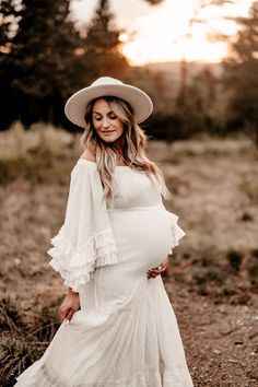 The ruffled sleeves on this boho dress add a playful and romantic touch to the overall look. We add lace details to create a more unique and intricate design. Versatile and fashionable choice that can be worn for a variety of photo shooting occasions. #centralcoastmaternityphotographer #lovephotography #californiamaternityphotographer #bohodress #centralcoastphotographer #maternityphotgraphy #sydneymaternityphotographer #sydneyphotographer #melbournematernityphotographer White Summer Maternity Wedding Dress, White Maternity Wedding Dress For Summer, White Maternity Dress For Summer Beach, White Summer Maternity Dress For Wedding, White Maternity Beach Dress For Summer, White Maternity Dress For Summer Wedding, White Spring Maternity Dress For Beach, White Maternity Beach Dress For Spring, White Maternity Dress For Spring Beach Occasion