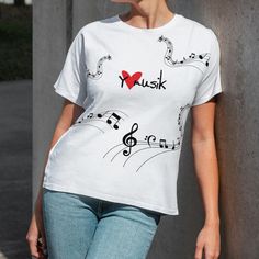 🎵 Musical Notes T-Shirt for Music Lovers 🎵 Immerse yourself in harmony with our exclusive musical notes t-shirt, designed for true music lovers. Made from 100% high-quality polyester and a thick microfiber fabric, this t-shirt offers a soft and lightweight feel that makes it ideal for any climate. Enjoy total comfort thanks to its regular fit without labels, and carry a symbol of your musical passion with you in every note you play. Assembled in the USA, it guarantees durability and style in every garment. Premium Material: 100% Polyester with Microfiber Fabric. Superior Comfort: Regular fit, tag-free and true to size. Quality Construction: Durable and assembled in the USA with global materials. Versatile: Thin and lightweight fabric (4.0 oz/yd² or 113 g/m perfect for any occasion. Avail White Music-themed Crew Neck T-shirt, Music-themed White T-shirt With Graphic Design, Music-themed White Graphic T-shirt, White Music-themed T-shirt With Graphic Design, White Music-themed Graphic T-shirt, Music-themed T-shirt For Concerts With Sublimation Print, White Music-themed Top For Concerts, Music-themed White Cotton T-shirt, White Music-themed T-shirt With Screen Print