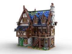 a model of a house made out of legos on a white background with the words,