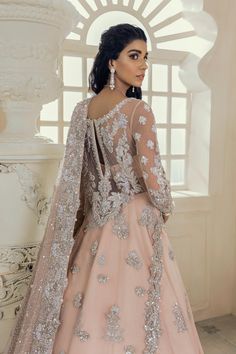 Delicately Embellished Peach Lehenga for Bridal Wear is all set to make a lasting impact in embellished work of kora, dabka, Mukesh, Resham, and zardozi, flooded on all lehenga gowns. The fabric used for this gown is chiffon. Net embroidered dupatta is paired with this gown with heavily embellished borders. SKU: 53 Lehenga For Bridal, Nameera By Farooq, Scalloped Shirt, Peach Lehenga, Walima Dress, Lehenga Gown, Pakistani Bridal Wear, Stylish Dresses For Girls, Net Dupatta