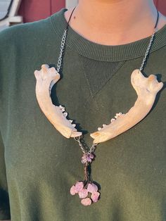 This Coyote Jaw Bone was found in the Arizona Desert during my travels - I personally found, cleaned, bleached & assembled these bones to make this necklace ✨  The jaw bones are about 5in in width each, the crystal tree is about 1in, combined they hang about 7in down  If you have any questions please ask :) Animal Bone Jewelry Gold, Jaw Bone Necklace, Jaw Accessory, Animal Bone Jewelry, Outfit Building, Art Mediums, Zen Space, Bone Necklace, Bone Jewelry