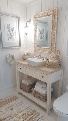 a bathroom with a sink, mirror and rug