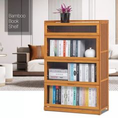 a book shelf with books and a potted plant sitting on it's top