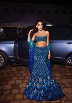 Janvi Kapoor Peacock Lehenga, Neha Sharma Gown, Jhanvi Kapoor Peacock Lehenga, Jhanvi Kapoor Indian Wear, Teal Lengha, Peacock Dress Design, Jhanvi Kapoor Outfits, Summer Lehenga, Blue Bridal Lehenga