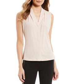 From Calvin Klein&#x2C; this top features:matte jersey fabricationv-neckline with center pleat designsleeveless with shoulder pleating detailshigh low hemlinepullover constructionapprox. 24" lengthpolyester/spandexdry cleanImported. Tops And Blouses, Women's Shirts, Jersey Top, Dillard's, Latest Fashion For Women, Womens Clothing Tops, Stylish Outfits, Fashion Clothes Women, Top Styles