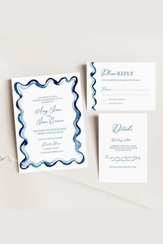 the wedding stationery is laid out and ready to be used as an enclosure for guests