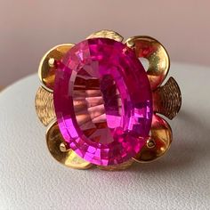 I Do Not Think This Ring Requires A Lot Of Introduction: Its One Of A Kind!!! Here Is Some Info On It: Done In Solid 14k Yellow Gold (Tested, Not Stamped, 100 % Guaranteed) , Size 8.75 On Ring Mandrel, Weights 11.79 Grams. The Huge, Oval, Faceted Intense Pink Synthetic Sapphire Stone Is Approx. 21mm By 17 In Size . The Whole Ring "Face" Is Approx. 26mm Long By 27mm Wide .The Ring Sits 14mm High Off The Finger. The Stone Displays No Visible To The Naked Eye Scratches. This Is An Amazing , Grand S Formal Pink Flower-shaped Rings, Elegant Faceted Ruby Ring For Formal Occasions, Elegant Formal Faceted Ruby Ring, Elegant Flower Ruby Ring For Formal Occasions, Elegant Faceted Ruby Ring In Yellow Gold, Elegant Yellow Gold Faceted Ruby Ring, Classic Flower Gemstone Jewelry, Classic Flower-shaped Gemstone Jewelry, Luxury Pink Flower Ring For Formal Occasions