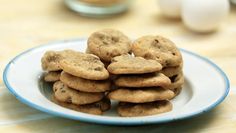 a white plate topped with cookies on top of a table