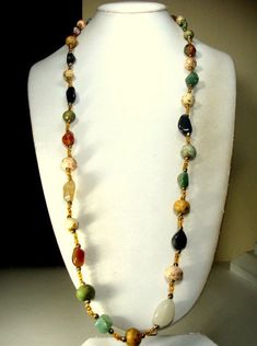 "Porcelain & Gemstone Bead Necklace with Glass Spacer Beads, Multicolors Agate, Jasper, Carnelian Nuggets Necklace length is 33\" ( 83.82cm ) These stone beads are a little crude, Nuggets and almost round with a lovely earthy color design combo...great colors, please scroll to the closeup photo. ------------------ PLEASE NOTE I ONLY ship to your paid ETSY invoice address Please Email any questions..I answer 7 days a week, except when I am sleeping!! VINTAGESTARRBEADS www.vintagestarrbeads.et Multicolor Large Beads Agate Necklace, Multicolor Agate Beaded Necklace With Large Beads, Multicolor Agate Large Beaded Necklaces, Multicolor Agate Gemstone Beads Necklace, Multicolor Agate Necklaces With Large Beads, Multicolor Agate Gemstone Beaded Necklace, Hand-strung Multicolor Beads Gems And Cabochons For Gifts, Multicolor Hand-strung Beads, Gems, And Cabochons For Gifts, Multicolor Hand-strung Agate Beaded Necklaces