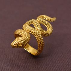 Snake Ring, Brass Gold Ring, Wrap Ring, Serpent Ring, Snake Ring, Triple Coil Brass Ring, Brass Jewelry, Snake Ring, Halloween, Gifts Material:- Brass Size:- Any Wearing a metal ring, especially made of brass, by a seeker on the ring finger stabilizes the body & provides the fundamental support for sadhana or spiritual practices. With the right kind of sadhana, wearing snake ring can become a key to mystical dimensions of life. Once worn, the ring belongs to you and you alone. Snake rings or Unique Gold Snake-shaped Rings, Gold Snake-shaped Ring For Anniversary, Gold Snake Shape Rings For Anniversary, Serpent Ring, Egyptian Jewelry, Snake Ring, Brass Ring, Gold Snake, Wrap Rings