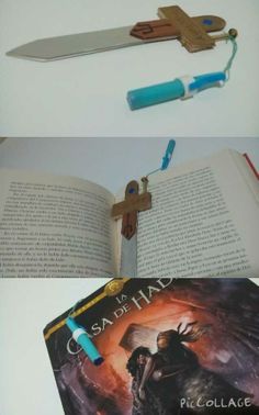 an open book sitting on top of a table next to a cross and a knife