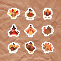 a bunch of turkey stickers sitting on top of a piece of brown tissue paper