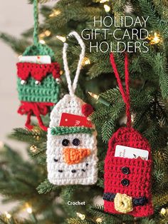 crocheted christmas ornaments hanging from a tree