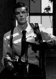 a black and white photo of a man with tattoos on his arm, wearing suspenders