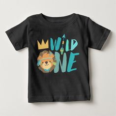 a toddler's t - shirt with the words wild one printed on it