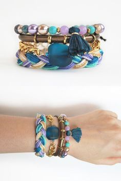 This is a boho bracelet stack of 4 bracelets which are made in golden, turquoise and violet colors. Bohemian style bracelets are great festival wear Bohemian Blue Stackable Friendship Bracelets, Bohemian Stackable Bracelets For Festival, Bohemian Stackable Festival Bracelets, Blue Bohemian Wrap Bracelet For Festivals, Turquoise Stackable Bracelets For Festivals, Bohemian Stackable Friendship Bracelets For Festivals, Bohemian Purple Friendship Bracelets For Festival, Bohemian Stackable Bangle Wrap Bracelet, Bohemian Gold Stackable Friendship Bracelets