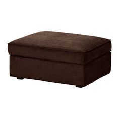 a brown ottoman sitting on top of a white floor