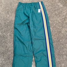 Talbots Size 10 Boys Pants Nwt 100% Polyester With Navy Mesh Lining On The Inside Elastic Waist; Blue, White And Yellow Striped Trim On Both Sides Velcro Closure On The Bottom Outside Hem Of Both Legs 2 Front Pockets And 1 Back Pocket With Flap Top Casual Blue School Pants, Sporty Green Bottoms For School, Casual Green School Bottoms, Casual Green Bottoms For School, Sporty Blue Bottoms For School, Polyester Pants, Yellow Stripes, Kids Bottoms, Kids Boys