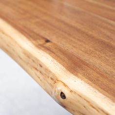 a close up view of a wooden bench