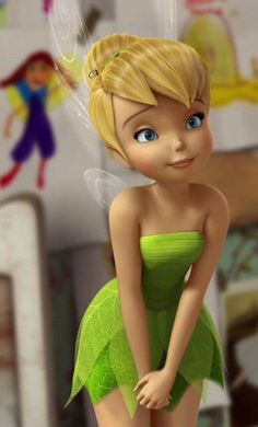 the tinkerbell fairy is standing in her green dress and holding on to something