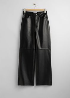 Leather trousers with a jeans-inspired, 5-pocket finish and a slim, straight leg. • Duo front pockets • Small coin pockets • Duo back pockets • Top-stitched detailing • Belt loops Length of inseam: 78.5cm / 30.9" (EU 36 / UK 8 / US 4) Satin Wrap Skirt, Wrap Shirt Dress, Wool Knitted Dress, Leather Boots Heels, Mock Neck Dress, Wrap Shirt, Leather Heels Sandals, Party Skirt, Leather Trousers