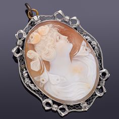 Weight: 9.5 Grams Stone: Cameo Shell Measurements: 43.2 x 34.2 mm Hallmark: 14K  ITEM #:BR-749-080522-17 Luxury Hallmarked Oval Brooch, Luxury Oval Jewelry For Opera, Luxury Silver Oval Brooches, Elegant Carved Brooches For Gifts, Oval Hallmarked Brooch For Formal Occasions, Ornate Oval Brooch For Formal Occasions, Carved Oval Brooch For Formal Occasions, Carved Oval Brooch For Formal Wear, Formal Oval Hallmarked Brooch