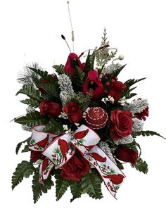 a bouquet of red roses and greenery with ribbon tied around the center, on a white background