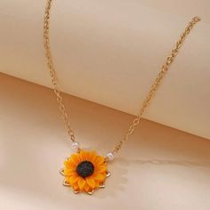 This Pretty Sunflower Necklace Is A Wonderful Addition To Your Wardrobe And Your Style! A Fun And Unique Piece! Gsunmu50q00jurs Yellow Flower Necklace For Summer, Summer Yellow Flower Necklaces, Summer Yellow Flower Necklace, Orange Flower-shaped Jewelry For Beach, Orange Flower Jewelry For Beach, Orange Necklace For Spring Gift, Orange Necklace For Spring Season Gift, Yellow Flower Necklace For The Beach, Yellow Flower Necklace For Beach