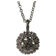 Stunning sparkling pendant necklace in 14KT whtie gold,made with natural diamonds of 1.43 carats in an open floral design. This necklace was handmade to perfection and hand finished for that extra sparkle! METAL: 14KT gold NATURAL DIAMOND(S) Clarity/Color: SI-I clarity/G-H color Cut: Round Brilliant Carat:1.43ct Grams:1.51gr size: 18" chain Item:160-00088 ORM WHAT YOU GET AT STAMPAR JEWELERS: Stampar Jewelers, located in the heart of Jupiter, Florida, is a custom jewelry store and studio dedicat Jupiter Florida, Floral Pendant Necklace, Halo Pendant, Floral Pendant, Design Floral, 14kt Gold, Jewelry Store, Cut And Color, Halo Diamond