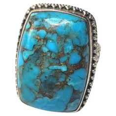 This beautiful, rare, comfortable ring is made from a high-quality Arizona Morenci turquoise cabochon in the sterling silver set. The Morenci turquoise stone is approximately 26mm x 17.6mm The US size of the ring is 7. The weight of the ring is 13.4 grams. Recognized for its unusual pyrite matrix, Morenci turquoise comes in Greenlee County from southeast Arizona, near the New Mexico border. Colored from light to bright blue, the stone is named for the Morenci Copper mine. Morenci turquoise is hi Mexico Border, Morenci Turquoise, Iron Pyrite, Modern Ring, Turquoise Sterling Silver, Turquoise Stone, Modern Jewelry, Cocktail Rings, Bright Blue