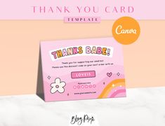 a thank card for a baby shower with flowers and hearts on the front, in pink