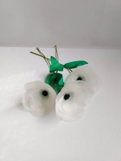 This listing is for 3 handmade fabric flowers with stems. Flowers are made from layers of ivory organza fabric, green satin fabric and black beads. Each flower measures approximately 2.5 inches/ 6.5 cm in diameter. Length of the steam measures about 8 inches/ 20 cm. This flowers are great for autumn decor, home decor, table decor, wedding decor, office decor, bouquet arrangement and more. My home is a smoke-free and pet-free. Have a custom request, please contact me. Green Satin Fabric, Bouquet Arrangement, Bouquet Arrangements, Artificial Flower Arrangements, Organza Fabric, Green Satin, Black Beads, Floral Decor, Fabric Flowers