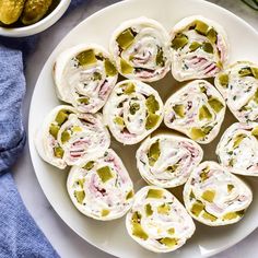 a white plate topped with different types of appetizers