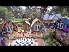 this is an aerial view of some houses in the yard with chess boards on the ground