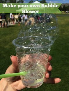 a person holding up a plastic cup with bubbles in it and the words make your own bubble blower