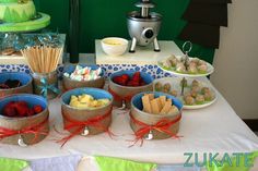 an assortment of desserts and snacks on a table