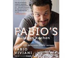 the cover of fabio's italian kitchen cookbook, featuring a man leaning over a pie