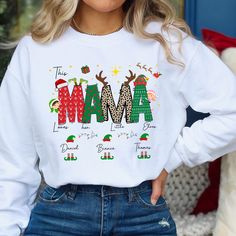 Elevate your Christmas spirit with our Personalized Elf Mama Shirt. This Mama proudly shows her love for her Elves with a custom touch. Perfect for spreading holiday cheer and laughter, this shirt is an ideal gift for mothers who adore their little elves. Available in tees, sweatshirts, and hoodies, it's a heartwarming and humorous addition to any mom's holiday wardrobe. * Gildan Soft Style and Gildan Unisex. * This design will be made with DTF film print. * Printed in the USA. SIZE  * Take a lo Personalized Elf, Mama Sweater, Love For Her, Mama Tee, Mama Sweatshirt, Holiday Wardrobe, Christmas Mom, Mama Shirt, Custom Christmas