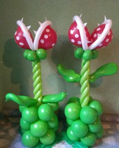 two balloon sculptures made to look like flowers