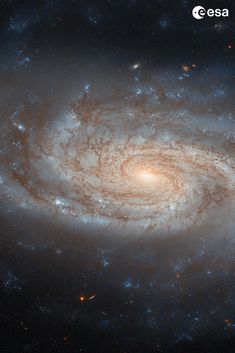 an image of a spiral galaxy in the sky