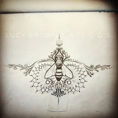 a drawing of a bee on top of a piece of paper with the words lucy brown attoos above it