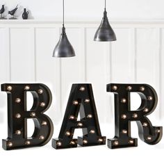 PRICES MAY VARY. LIGHT UP YOUR BAR： Letter Marquee Letter Signs “BAR”, especially suitable for the bar which fit the bar theme perfectly. If you want to have a party at home, it is also an ideal eye catching addition to party decoration. Furthermore, it is easier to create a bar atmosphere by decorating the light in your own pub. Battery Operated: Requires 2 aa batteries(not included), ON and OFF switch on the back. LIGHT UP LETTER: Size: 8.86”(H) x 1.77”(D)，Requires 2 aa batteries(not included) Light Up Bar Sign, Number Lights, Eclectic Lighting, Lighted Marquee Letters, Fancy Sprinkles, Decoration Bar, Christmas Lamp, Light Up Letters, Marquee Lights