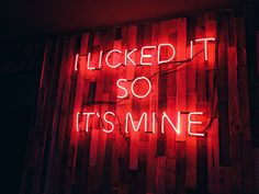 a neon sign that reads, i looked it so it's mine on the wall