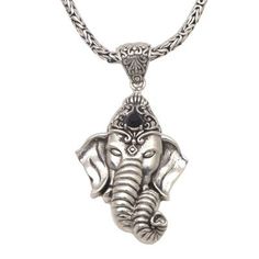 The Hindu elephant deity Ganesha known as the 'Remover of Obstacles' is the theme of this pendant necklace from Rosalia Tarigan in Bali. The designer creates a pendant of Ganesha's head which is crowned with an elaborate headdress bearing a faceted onyx stone. The pendant centers a sleek sterling silver Borobudur chain. Spiritual Oxidized Temple Necklace, Spiritual Carved Necklaces For Festivals, Spiritual Oxidized Necklaces For Puja, Oxidized Amulet Necklace For Puja, Jewelry Novica, Hindu Jewelry, Hindu Elephant, Onyx Pendant, Mabe Pearl